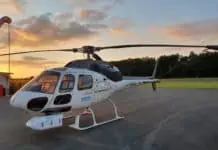 Smart Aerial Powerline inspection: Für die Inspektion der Leitungen bringt Siemens Energy ein Multisensor-System an der Unterseite eines Helikopters an.