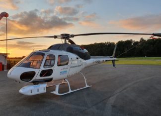 Smart Aerial Powerline inspection: Für die Inspektion der Leitungen bringt Siemens Energy ein Multisensor-System an der Unterseite eines Helikopters an.
