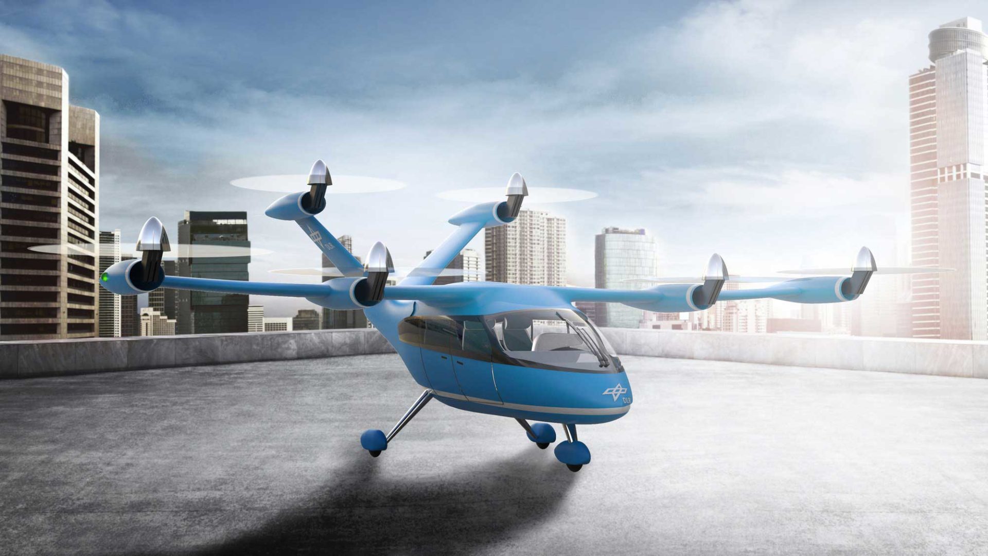 Design eines Tiltrotor-Lufttaxis mit sechs schwenkbaren Rotoren. Ausgelegt ist dieses Konzept für vier Passagiere und eine Reichweite bis 100 Kilometer. Die maximale Abflugmasse beträgt 2.000 Kilogramm, die Nutzlast 360 Kilogramm und die Reisefluggeschwindigkeit 200 Stundenkilometer.