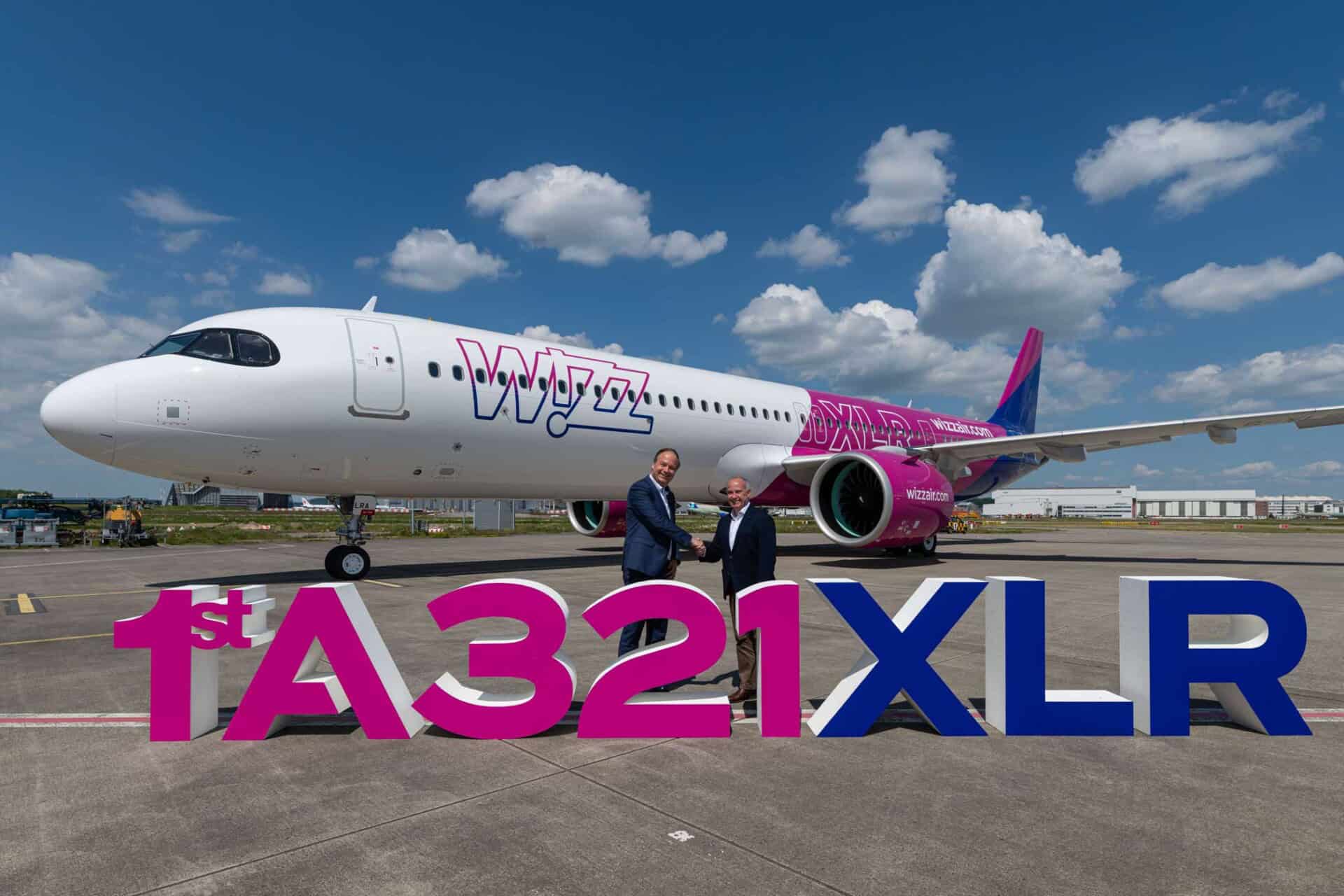 Owain Jones, Chief Corporate Officer of Wizz Air (right), and Christoph Zammert, Airbus EVP Head of A320 Family Programme, at the delivery of the first A321XLR to Wizz Air.