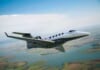 Embraer Phenom 300 in flight