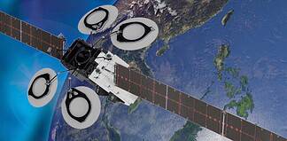 On-orbit rendering of the Nusantara Lima (SNL) satellite overlooking the Indonesian archipelago