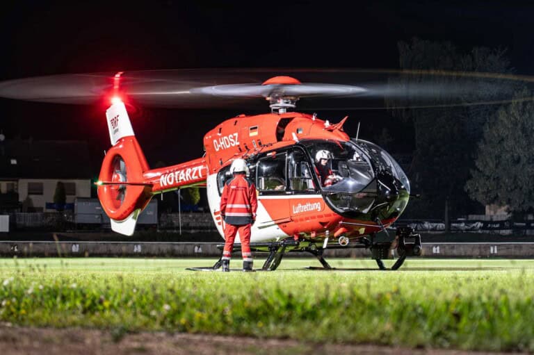 A DRF air ambulance H145 at night.