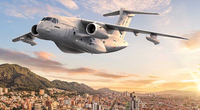 Colombia invests in Embraer’s KC-390 Millennium. Aerial view of an Embraer KC-390 in front of modern architecture in Bogotá, Colombia.
