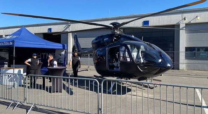 Helicopters in the spotlight at AERO 2027: A milestone for business and training aviation Airbus Helicopters H135 (formerly Eurocopter EC135) in a dark, special livery from HTM (Helicopter Travel Munich) at the AERO exhibition