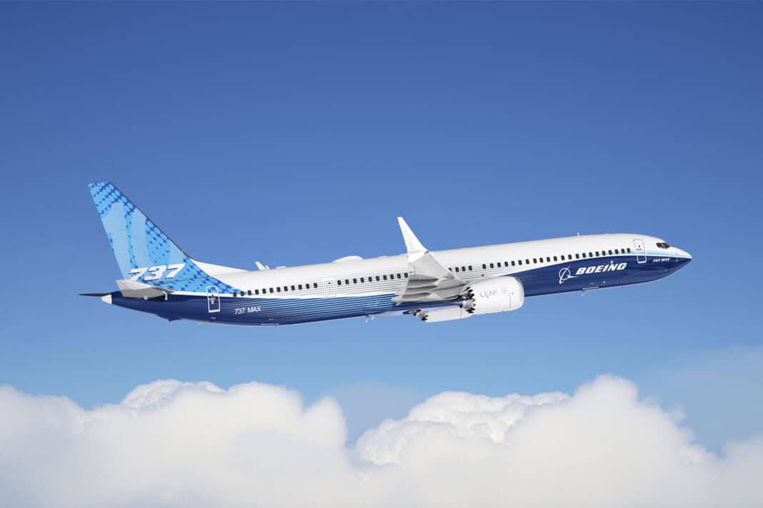 Boeing 737-10 flies above the clouds