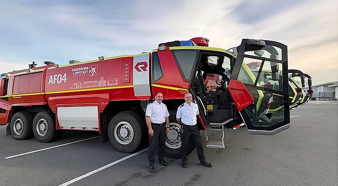 The head of the airport fire department, Roland Kempkensteffen (left), and his deputy, Thorsten Bösch, in front of the Rosenbauer PANTHER 8x8 airfield crash tenders.